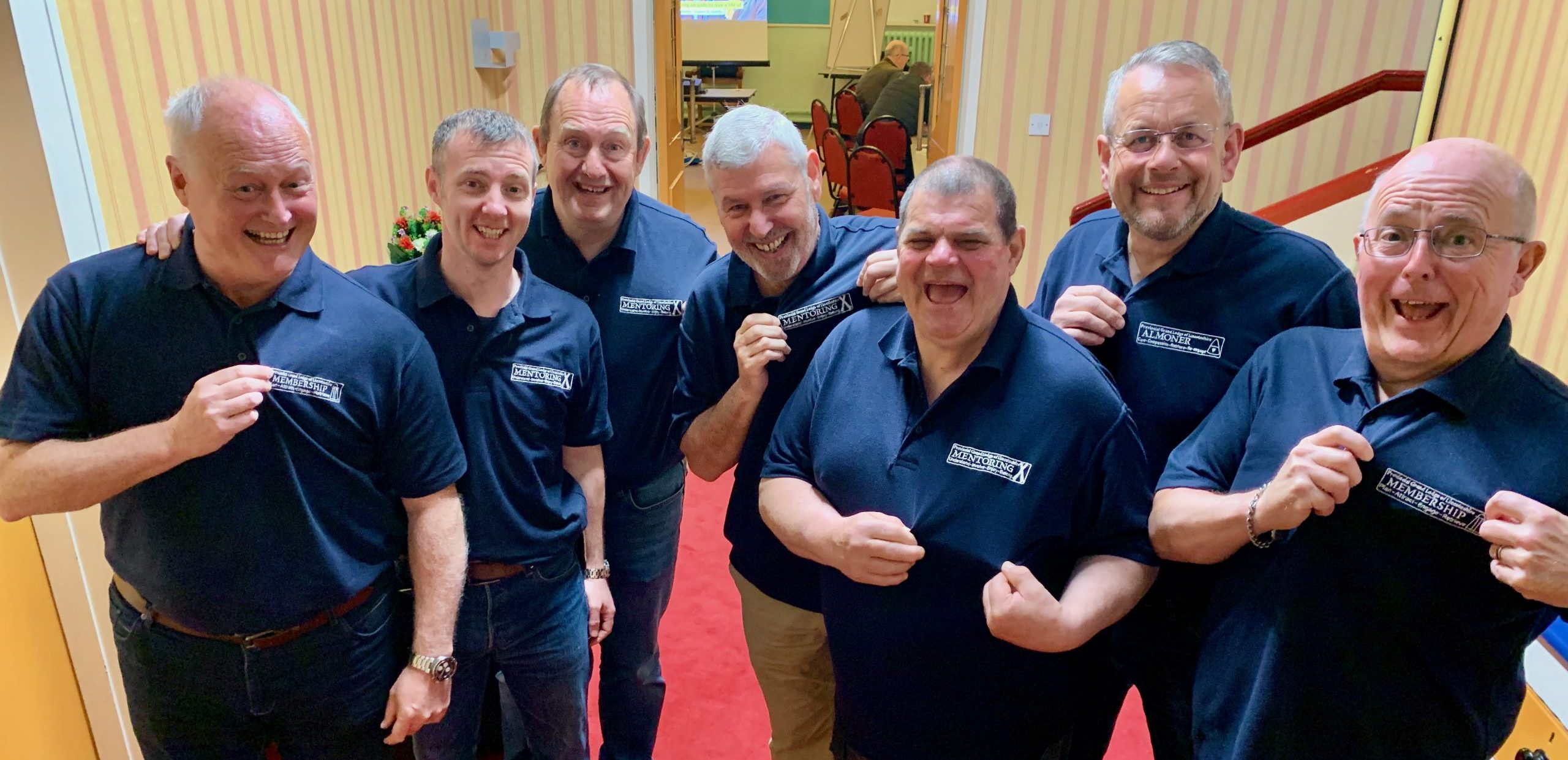 Members of the Lincolnshire Pathway Rollout team show off their branded blue polo shirts